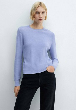 Light lavender knit sweater with a round neck, ribbed texture, and long sleeves, paired with black trousers. Simple, minimalist design.