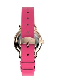 Timex ur med en rund sort skive, pink læderrem, hardware i rosaguld og spænde-lukning. Har justerbare huller til tilpasning.
