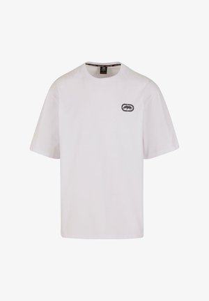 Fehér, rövid ujjú póló pamutból, bal mellkason egy kis szürke logó grafikával. Klasszikus környakú dizájn.