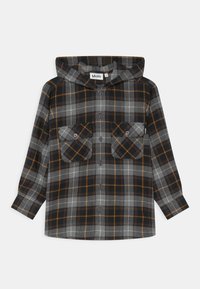 Flanellskjorta med huva i grå, svart och orange rutmönster. Har två framfickor och knäppning med knappar. Mjuk, texturerad tyg.