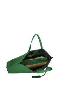 Sac cabas structuré vert avec une poignée supérieure, doublure contrastante bleu marine, poche intérieure zippée et fermeture magnétique. Texture lisse.