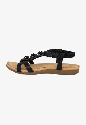 Schwarze Sandalen mit geflochtenem Riemen, floralen Verzierungen, einem gepolsterten beigen Fußbett und einer flexiblen, strukturierten Außensohle.