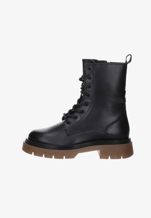 Black leather ankle boots with a rounded toe, lace-up design, and a thick brown rubber sole. Features a pull tab at the back and stitching details.