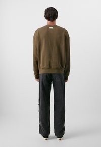 Don't Waste Culture MASON UNISEX - Loose fit -farkut - washed black