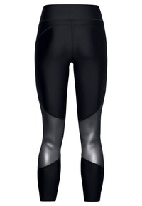 Svarta atletiska leggings med en elegant design, glänsande silverpaneler, hög midja och ett mjukt, stretchigt material.