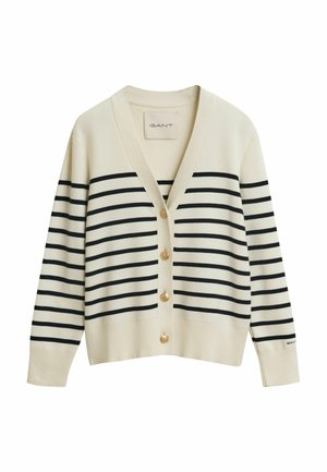 Beige cardigan met marineblauwe horizontale strepen, goudkleurige knopen en een V-hals. Heeft lange mouwen en een zachte brei structuur.