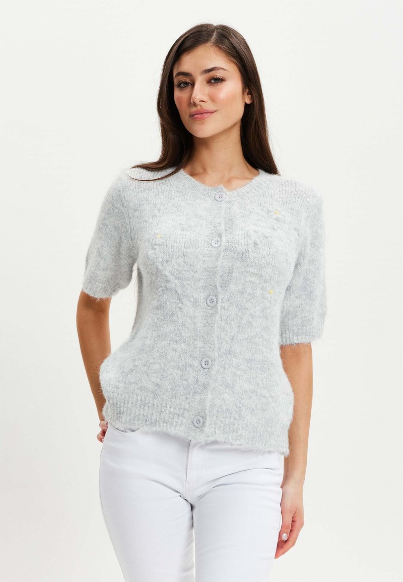 Light gray, fuzzy cardigan with short sleeves, front button closure, and subtle textured pattern. Soft material; casual design.