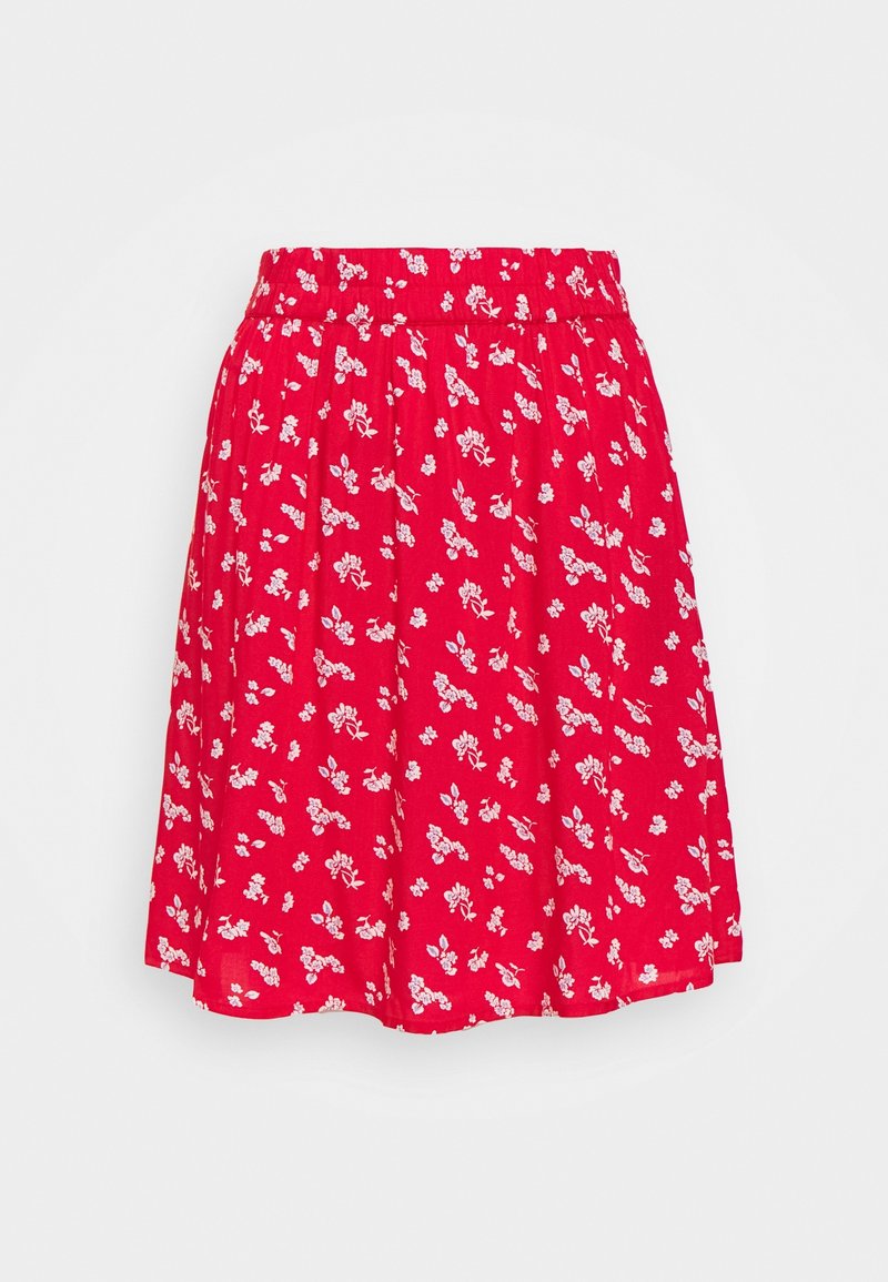 Jupe rouge à motif floral, avec ceinture élastique, design évasé et tissu léger. Présente de petites fleurs blanches et roses sur un fond uni.