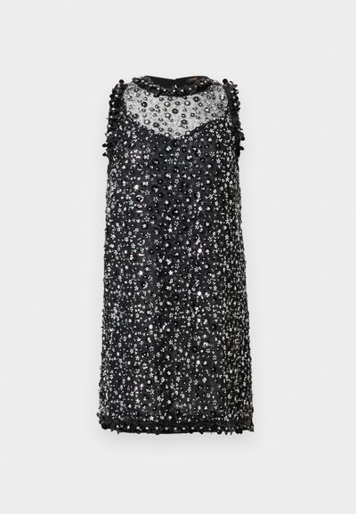 Robe mini noire sans manches avec un haut en tulle transparent, ornée de motifs floraux pailletés noirs et argentés ainsi que de perles texturées.