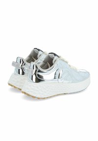 Silver metallic sneakers with textured white sole, round toe, and lace-up front. Features reinforced heel and logo on the back strap.