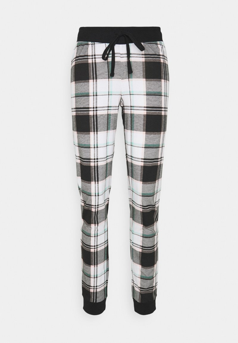 Karirane trenirke z vzorcem črno-belih in turkiznih kvadratov, s trakcem za prilagajanje v pasu in črnimi rebrastimi manšetami na gležnjih.