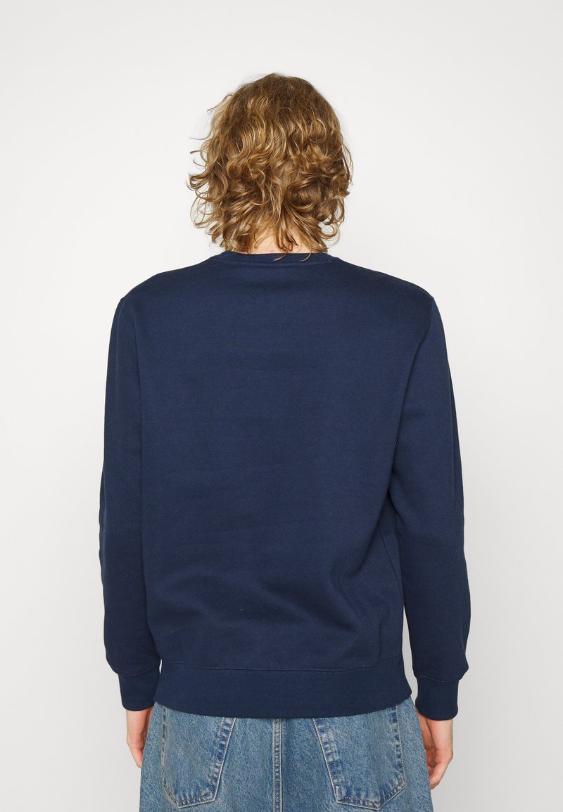dark blue crewneck sweatshirt