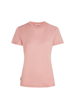 Lichtroze t-shirt met korte mouwen. Katoenen materiaal, ronde hals, aansluitend ontwerp, gladde textuur, met een klein logo-label aan de zijkant.