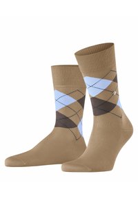Brązowe skarpetki z wzorem w diamenty w niebieskim i brązowym kolorze, z prążkowanym ściągaczem i gładką fakturą. Wyróżniające się detale to kontrastujące kolory.