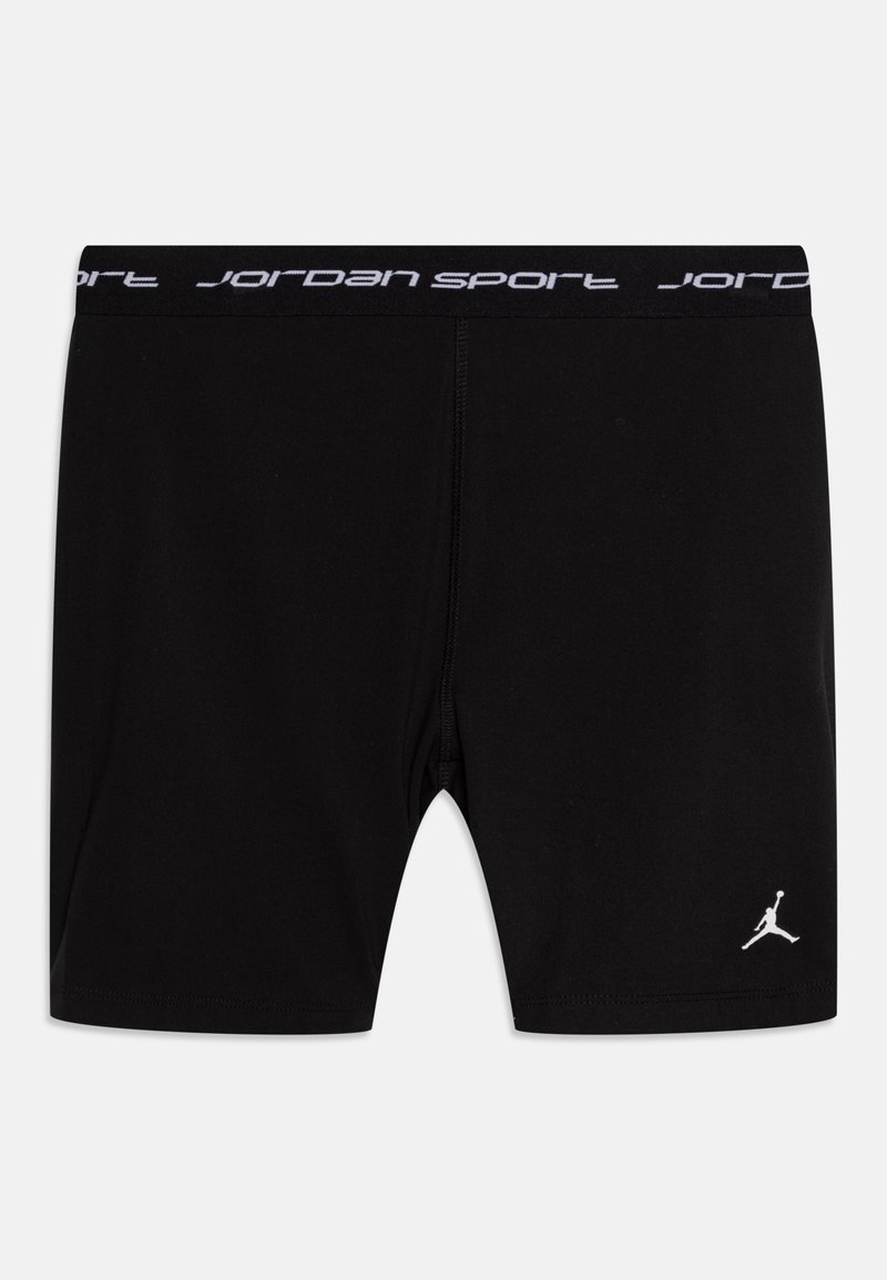 Melnas sporta šortu bikses ar ciešu piegriezumu, ar baltu "Jordan Sport" logotipu uz jostasvietas un baltu Jumpman simbolu kreisajā apakšējā kājā.