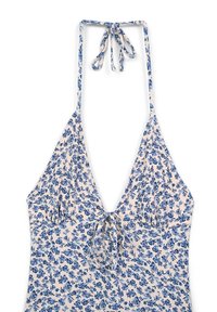Abito halter floreale in tessuto chiaro con motivi di fiori blu, caratterizzato da una profonda scollatura a V e un dettaglio a fiocco sul busto.