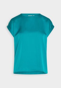 Top in satin teal con maniche corte arrotolate, scollo rotondo e vestibilità rilassata. Tessuto liscio e bordi puliti per un aspetto minimalista.
