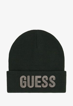 Zielona dziergana czapka z podwiniętym brzegiem, z haftem "GUESS" w kolorze szarym. Prosty design z teksturowanym wykończeniem.