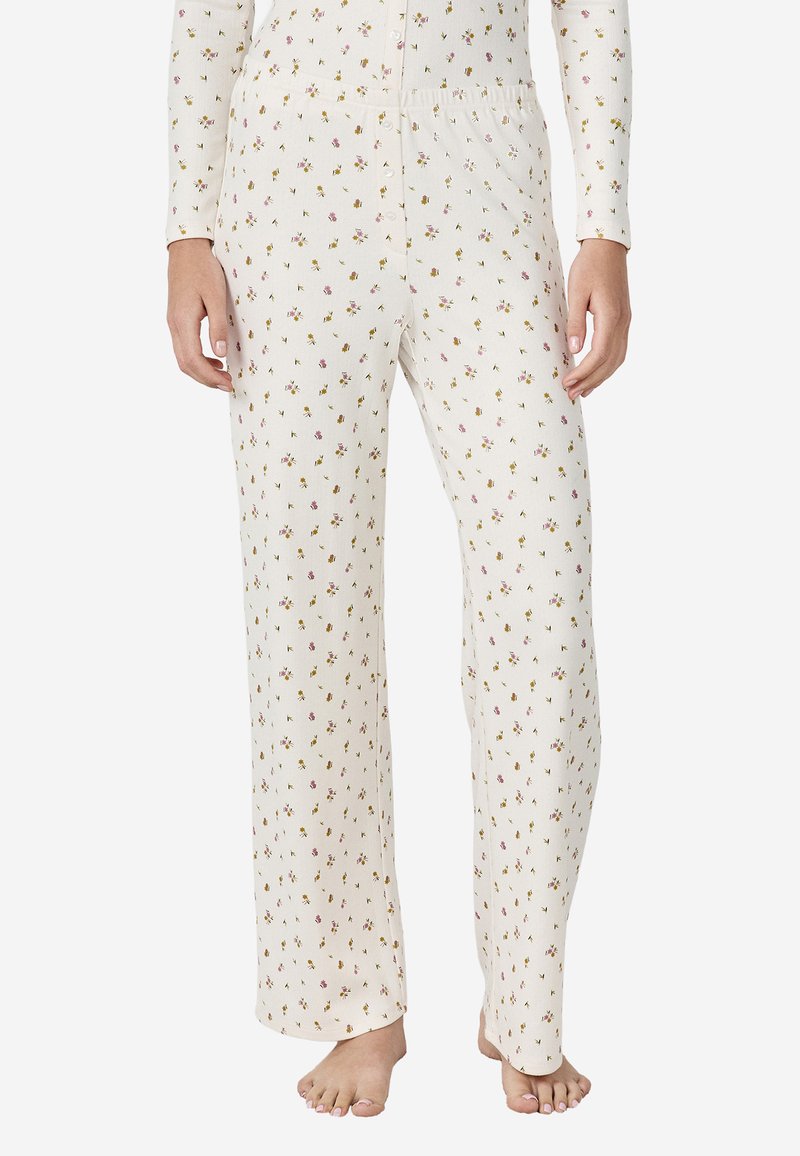 Pantalones de pijama ligeros en color crema con un estampado de flores dispersas en rosa, amarillo y verde. Diseño suave de pierna recta con una cintura elástica.