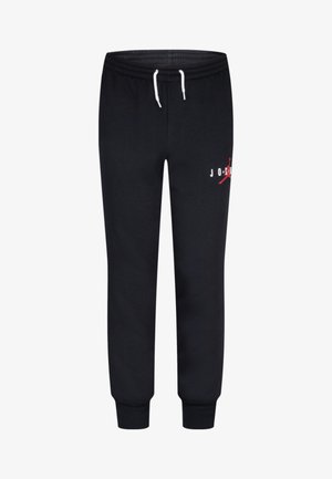 Pantaloni sportivi neri realizzati in tessuto morbido, con cintura elasticizzata e cordini bianchi, e un accento rosso del logo sul lato sinistro.