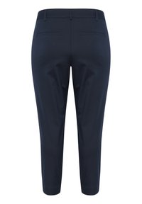 Navy trousers in a fitted design, featuring a smooth fabric texture, a mid-rise waistband, and two back pockets with no visible embellishments.
