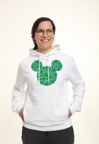 Sudadera blanca con un gran patrón floral verde en forma de silueta de Mickey Mouse, con capucha ajustable y puños acanalados.