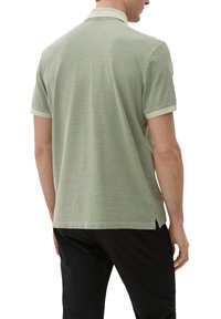 s.Oliver MIT ALLOVER - Poloshirt - olivgrün