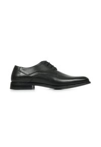 Scarpe eleganti in pelle nera con punta rotonda, superficie liscia, design con lacci e tacco basso a strati. Presentano un dettaglio di cucitura sottile.
