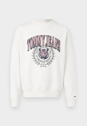 Witte sweatshirt met "TOMMY JEANS" in rode en roze tekst, een ronde grafiek met een tijger en laurieraccenten. Geribbelde zoom en manchetten.