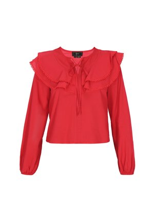 Červená blůza s dlouhým rukávem, která má rýškovaný límec a légu se zavazováním. Měkká tkanina se hladkým povrchem a elastickými manžetami.