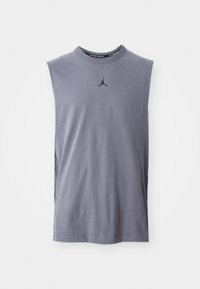 Maglietta senza maniche in cotone grigio con scollatura rotonda; presenta un logo Jumpman nero al centro anteriore, una texture liscia e una vestibilità rilassata.