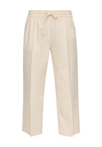 Pantalon beige à jambes larges avec taille élastique et cordon de serrage à l'avant, doté de poches latérales et d'une coupe décontractée.