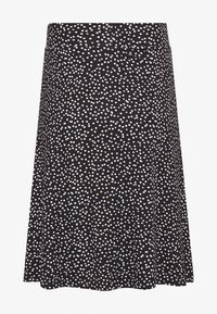 Jupe noire à pois blancs et bleu clair, en tissu doux, avec une coupe droite et une taille pour le confort.