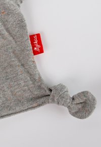 Gray fabric baby blanket with colorful speckles, knotted corners, and a red tag displaying the brand name, sigikid. Smooth texture.