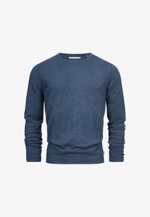 Maglione a maniche lunghe blu navy realizzato in un tessuto strutturato, con scollatura rotonda e dettagli di cucitura sottili. Vestibilità casual con polsini e orlo a coste.