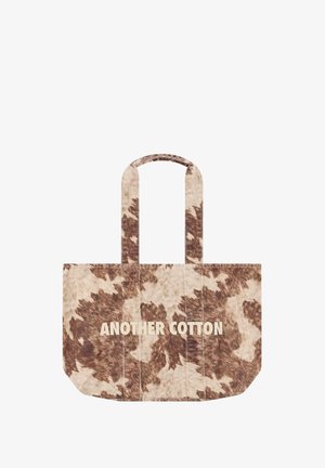 Braune und beige melierte Baumwoll-Tragetasche mit zwei Henkeln und dem Text "ANOTHER COTTON" in der vorderen Mitte bedruckt.