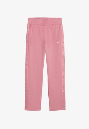 Pantalon de survêtement rose Puma avec taille élastique, bandes latérales avec petits logos Puma et logo Puma blanc sur la cuisse gauche.