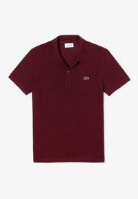 Polo bordeaux en coton, avec une patte à deux boutons, un col côtelé, des manches courtes et un logo vert brodé sur la poitrine.