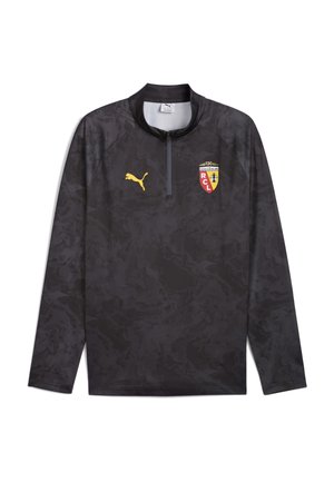 Zwarte sportieve langeklein top met een subtiel abstract patroon, halve ritsnek en Puma-logo; bevat een teamkruis met rode en gele accenten.