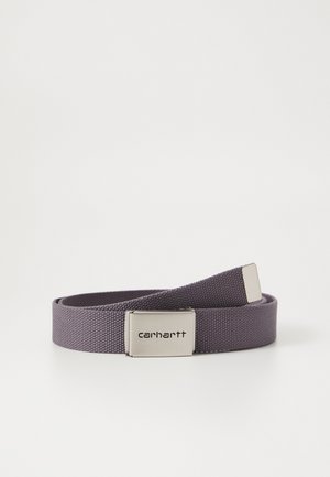 Purple woven fabric belt featuring a metal latch with engraved brand name. The belt has a smooth texture and a simple design.