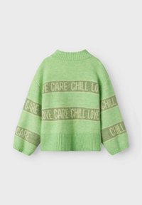 Green knitted sweater with a ribbed neckline and hem. Features horizontal stripes with the words "LOVE," "CARE," "CHILL" in contrasting shades.