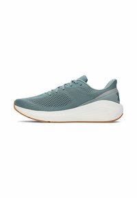 Scarpa sportiva di colore azzurro chiaro con tomaia in mesh traspirante, chiusura con lacci e suola bianca imbottita. Presenta un design testurizzato e un battistrada in gomma.