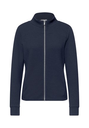 Veste pour femme bleu marine texturée avec fermeture éclair complète à l'avant, manches longues et col montant, présentée sur un fond blanc.