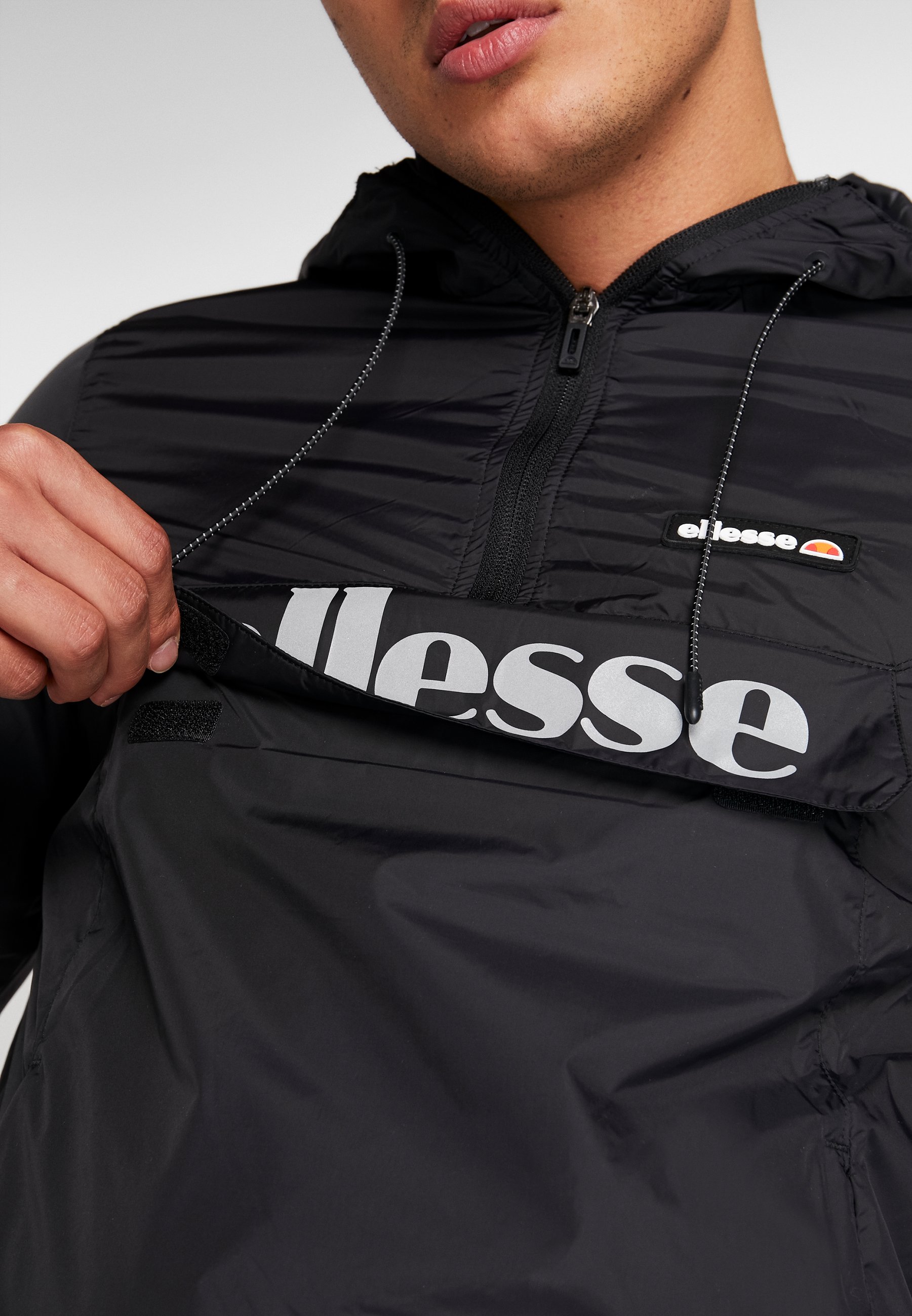 ellesse windbreaker schwarz