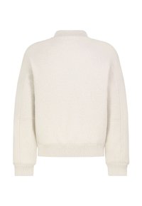 White fleece pullover with a round neck. Features ribbed cuffs and hem. Soft texture, relaxed fit, and minimalistic design.