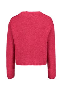 Beskaffad rosa stickad tröja med en strukturerad väv och långa ärmar. Baksidan har en rund halsringning och en lös passform. Ingen knäppning.