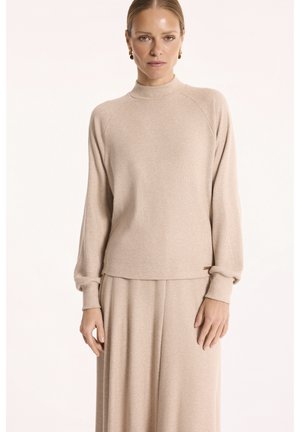 - Sweter
