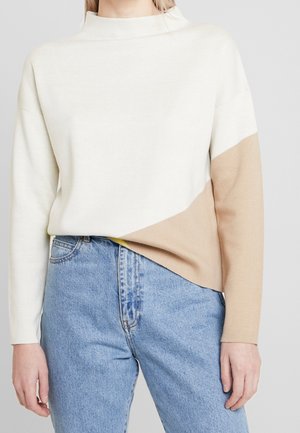 Stickad tröja - beige