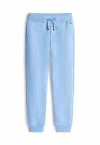 Pantalones de chándal de color azul claro, fabricados en tela suave, con una cintura elástica y cordón, bolsillos laterales y puños de canalé en los tobillos.