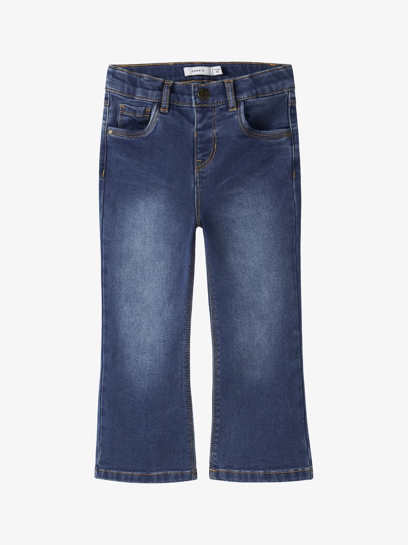 Tumesinised teksapüksid klassikalise sirge säärega, viie tasku ja kollase õmblusega ning ees nööpidega kinnitusega.